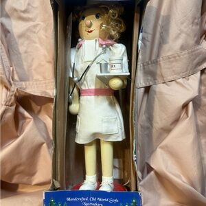 Handcrafted Nurse Nutcracker with Pink and White Accents